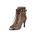 Bottes à talons aiguilles et lacets à bout ouvert en maille